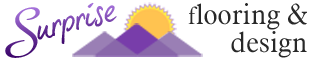 A purple mountain with an orange sun in the middle.