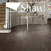 Shaw floors hardwood flooring in a home with stairs.