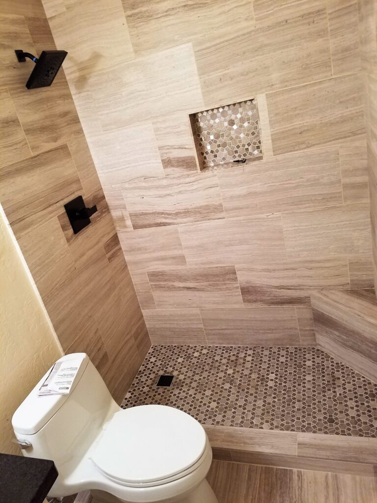 shower w- mosaic inlay with wooden design