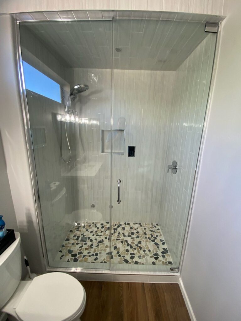 A modern Smith shower with glass doors